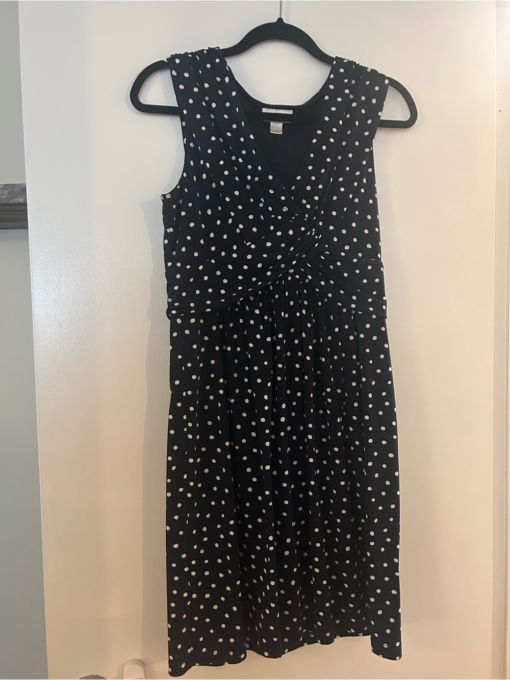 Sleeveless navy Polka Dot Twist-Front Dress